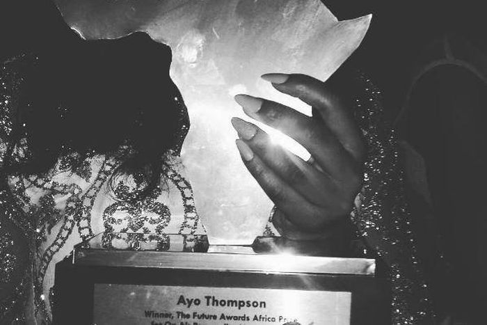 Ayo Thompson with her award