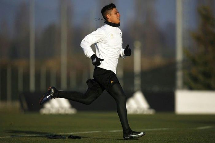 Juventus' forward Paulo Dybala from Argentina takes part in a training session on the eve of the UEFA Champions League football match Juventus Vs GNK Dinamo Zagreb on December 6, 2016 at the 'Juventus Training Center'