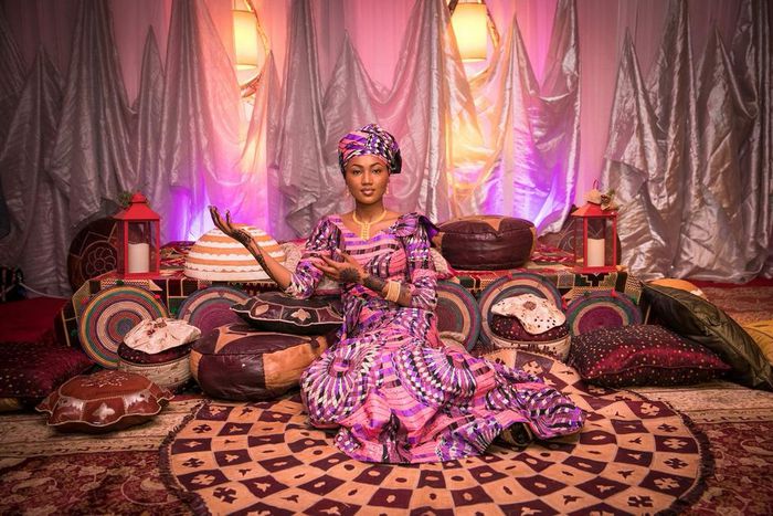 The bride strikes a pose at her Henna party