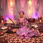 The bride strikes a pose at her Henna party