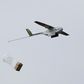 A Zipline delivery drone releases its payload midair during a flight demonstration at an undisclosed location in the San Francisco Bay Area, California, U.S., May 5, 2016. REUTERS/Stephen Lam