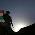 An Iraqi Kurdish Peshmerga fighter holds a position in Sheikh Ali village near the town of Bashiqa, on November 6, 2016