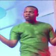 Rapper Olamide throwing up the middle finger at Headies 2015.