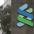 Singapore's financial regulator has fined two British banks, including Standard Chartered Bank, in a widening crackdown on money laundering linked to Malaysian state fund 1MDB