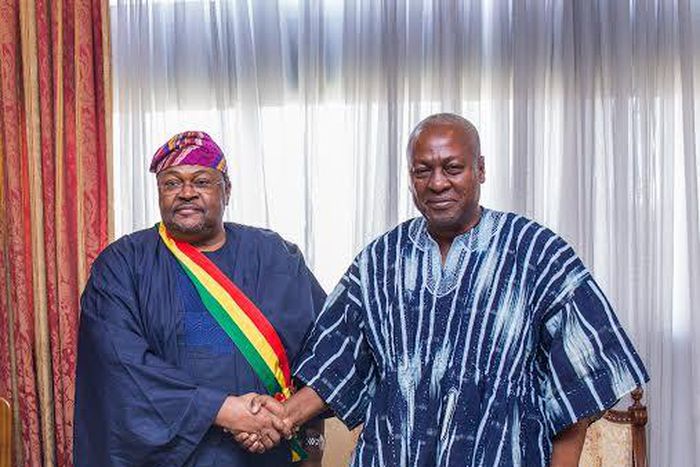 President John Mahama of Ghana (right) to Dr Mike Adenuga Jr: Congratulations for being a worthy son of Africa