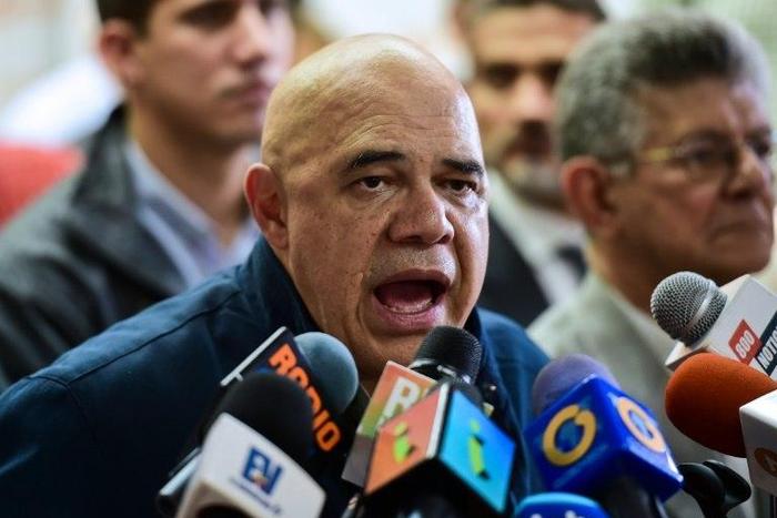 Jesus Torrealba, secretary general of the main opposition coalition, the Democratic Unity Roundtable, speaks during a press conference in Caracas on November 2, 2016