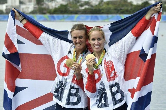 Britain's Heather Stanning (L) and Britain's Helen Glover pose with their Rio Olympic medals on August 12, 2016