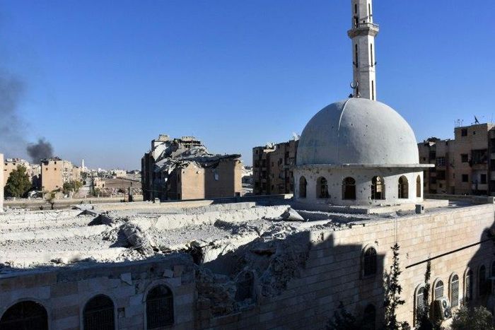 A picture taken on November 27, 2016 shows a damaged mosque in the Masaken Hanano district in eastern Aleppo, a day after Syrian pro-government forces reseized it from rebel fighters