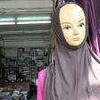 Islamic headware is sold in a Chinese owned store in the quarter of Derb Omar in Casablanca on March 10, 2011