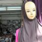 Islamic headware is sold in a Chinese owned store in the quarter of Derb Omar in Casablanca on March 10, 2011