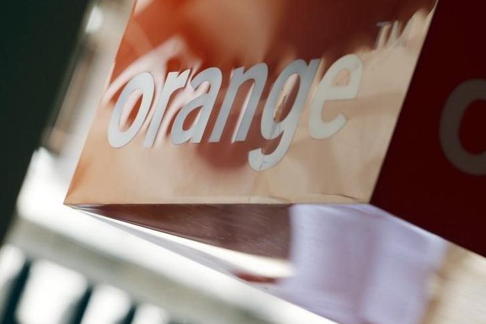 A logo is seen in a retail store of French telecom operator Orange in Bordeaux, southwestern France
