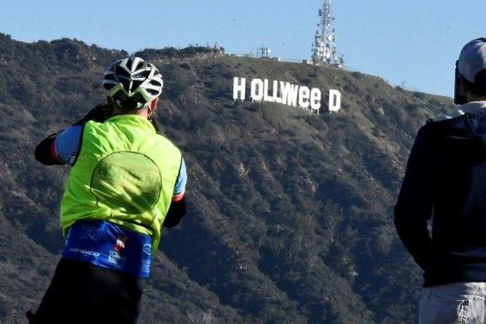 The famous Hollywood sign reads "Hollyweed" after it was vandalized, January 1, 2017