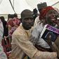 Released Chibok girls reunite with families in Abuja amidst tears
