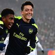 Alex Iwobi and Mesut Ozil
