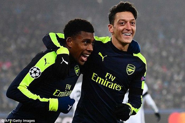 Alex Iwobi and Mesut Ozil