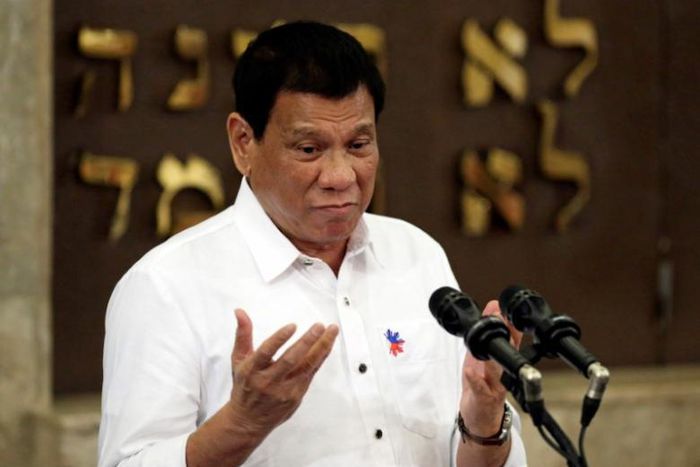 Philippine President Rodrigo Duterte gestures during his speech at the Beit Yaacov Synagogue, The Jewish Association of the Philippines in Makati city, metro Manila, Philippines October 4, 2016.