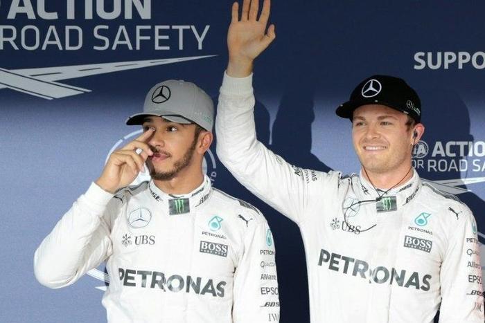 Nico Rosberg (right) will start alongside Lewis Hamilton on the front row as the two Mercedes drivers continue their domination at the Japanese Grand Prix