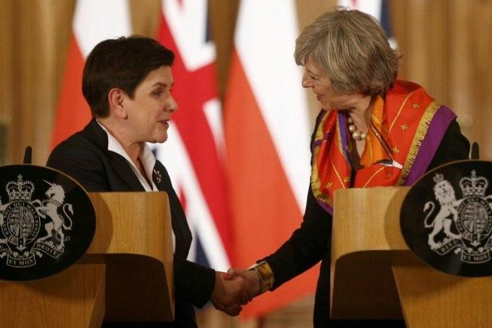 British Prime Minister Theresa May (R) and Polish Prime Minister Beata Szydlo give a joint press conference following their meeting at 10 Downing Street in central London on November 28, 2016