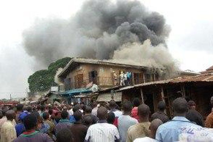 A scene of shops being razed by fire