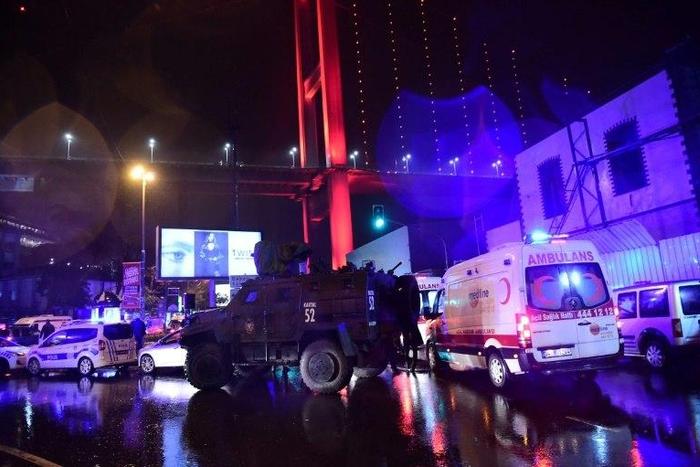 Turkish special force police officers and ambulances are seen at the site of an armed attack at the Reina nightclub in Istanbul on January 1, 2017
