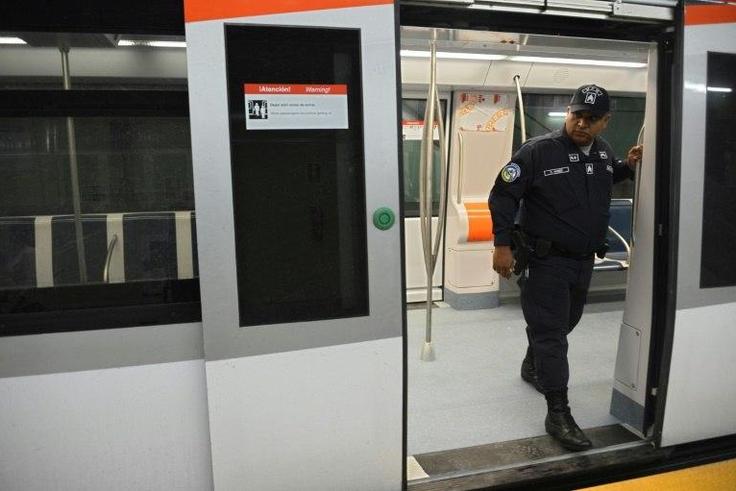 This photo shows a policeman standing guard in the new subway, which is one of the future projects Panama City removed Brazilian construction giant Odebrecht December 27, 2016, prior to creating a special office to probe the Odebrecht bribes
