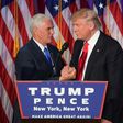 Republican presidential-elect Donald Trump (right) shakes hands with vice president-elect Mike Pence during a post election party in New York, on November 9, 2016
