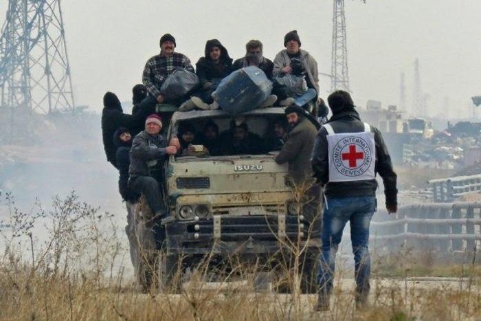 Syrians are evacuated from rebel-held parts of Aleppo on December 16, 2016