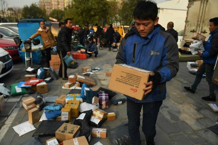 Packages are sorted for deliveries during the 'Double Eleven' Online Shopping Festival day in Beijing, on November 11, 2016
