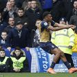 Alex Iwobi celebrates after scoring for Arsenal against Everton  on Saturday, March 19
