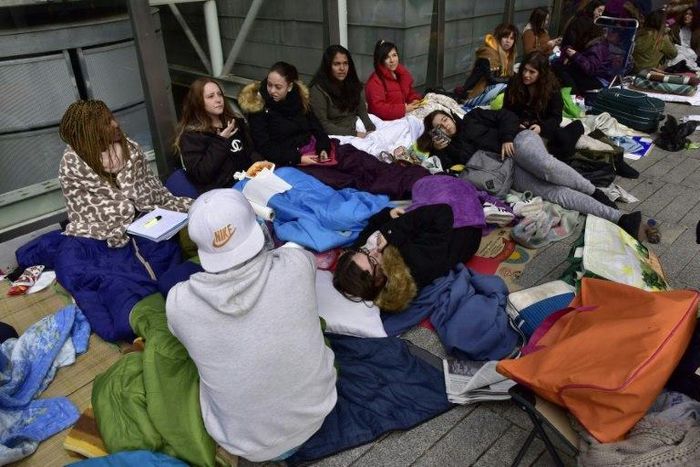 Fans of popstar Justin Bieber camp in front of the Palacio de Deportes in Madrid on November 18, 2016 in a bid to get as close as possible to their idol when the gates finally open for his concert there November 23