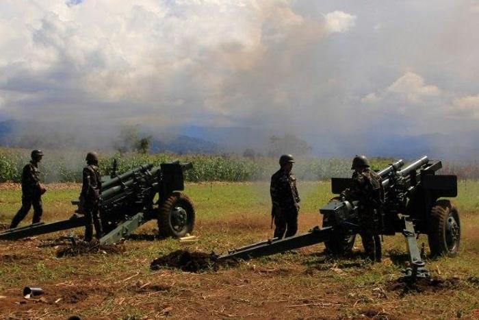 Philippine troops fire their 105mm howitzer cannons towards Islamic militant group positions from their base near Butig town in Lanao del Sur province, on the southern island of Mindanao, on November 27, 2016