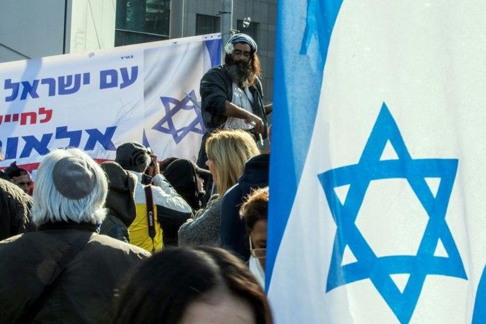 Israelis demonstrate outside the defence ministry in Tel Aviv in support of Israeli soldier Elor Azaria, who shot dead a wounded Palestinian assailant