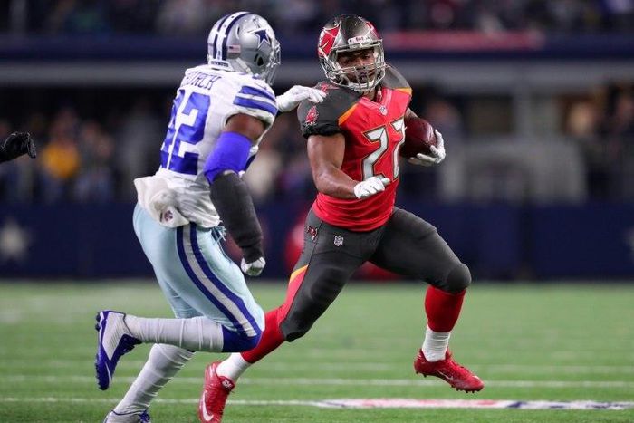 Doug Martin of the Tampa Bay Buccaneers carries the ball during the first half against the Dallas Cowboys at AT&T Stadium on December 18, 2016