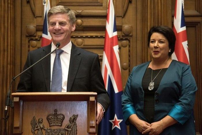 New Zealand's new Prime Minister Bill English (L) speaks to the media beside his deputy Paula Bennett during a press conference at Parliament in Wellington on December 12, 2016
