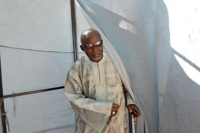 Gambian opposition leader Ousainou Darboe leaves a polling station during the 2011 presidential election