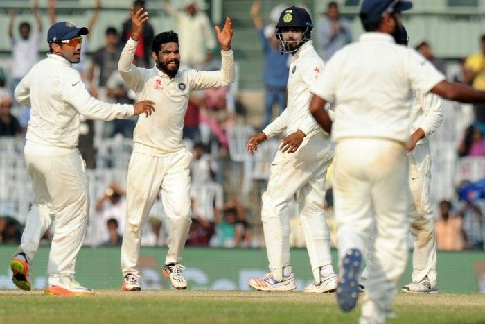 Indian's Ravindra Jadeja (2nd left) celebrates the wicket of England's Stuart Broad during the final Test in Chennai on December 20, 2016