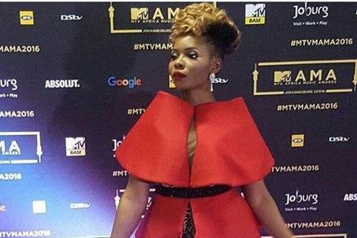 Yemi Alade performed in a red cape top paired with sequin bum shorts