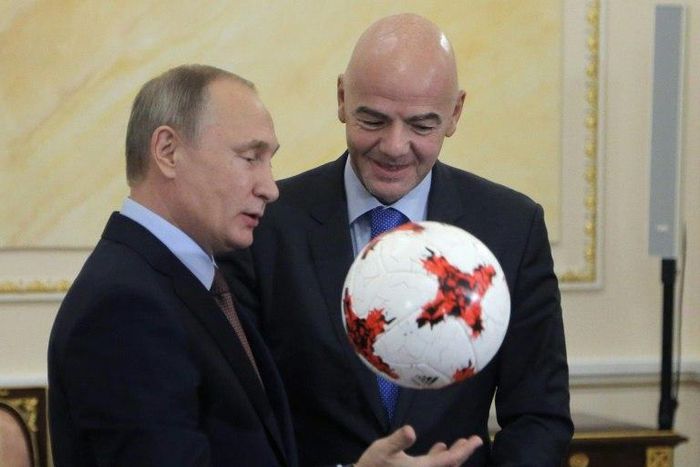 Russian President Vladimir Putin chats with FIFA president Gianni Infantino at the Kremlin in Moscow, on November 25, 2016