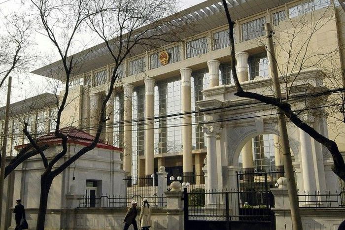 China's Supreme People's Court cleared Nie Shubin, who was shot by firing squad in 1995, saying facts in the original trial were "unclear" and evidence "insufficient"