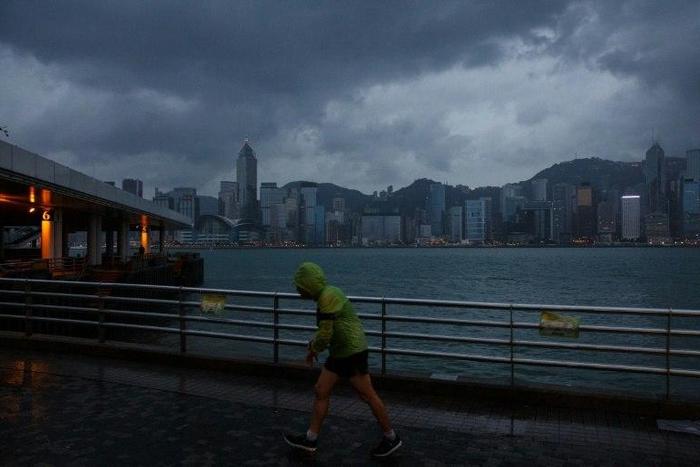 More than 200 flights have been axed in and out of Hong Kong, with schools and offices also shut as the typhoon looms.