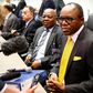 Nigeria's Oil Minister Emmanuel Ibe Kachikwu (R) talks to journalists before a meeting of OPEC oil ministers in Vienna, Austria, June 2, 2016.   REUTERS/Leonhard Foeger