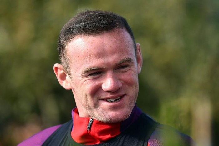 Rooney was thrown into the spotlight after The Sun tabloid alleged he drunkenly gatecrashed a wedding at England's team hotel in Watford, north of London, on Saturday