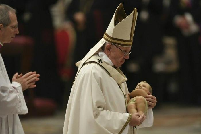 Pope Francis urged the world's 1.2 billion Catholics to feel compassion for children, notably victims of war, migration and homelessness in his Christmas Eve mass