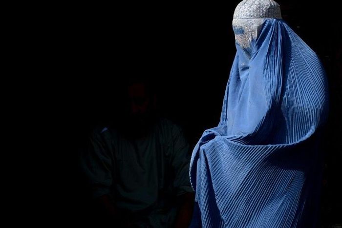 Dutch MPs have voted to approve a ban on wearing the Islamic full-face burqa in some public places such as schools and hospitals