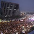 Protesters hold candles during a huge anti-government rally demanding the resignation of South Korea's President Park Geun-Hye in Seoul
