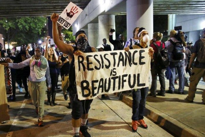 Charlotte protests diminish early on Friday as family views video