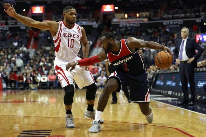 John Wall of the Washington Wizards (R) was fined $25,000 for bumping into official Marc Davis during the game against the Houston Rockets on November 7, 2016