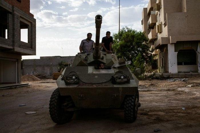 Misrata's fighters are pictured on a tank during clashes against Islamic State group in Sirte, Libya, on September 21, 2016