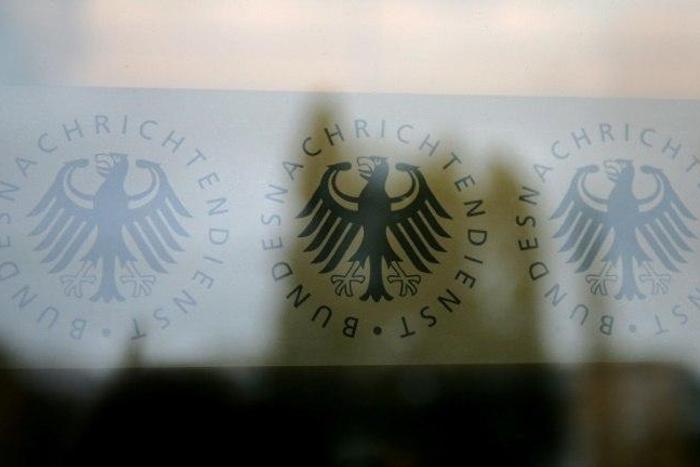 The German government insists that security measures at its domestic intelligence agency are sound after an agent was unmasked as a suspected Islamist