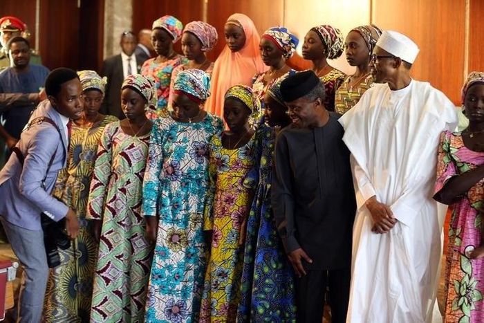 President Muhammadu Buhari and Vice President Yemi Osinbajo receive the 21 Chibok school girls released by Boko Haram, in Abuja, Nigeria October 19, 2016 REUTERS/Afolabi Sotunde